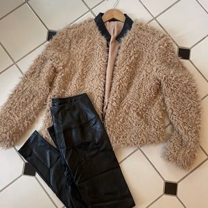 Faux fur jacket with faux leather trim.  Like new!